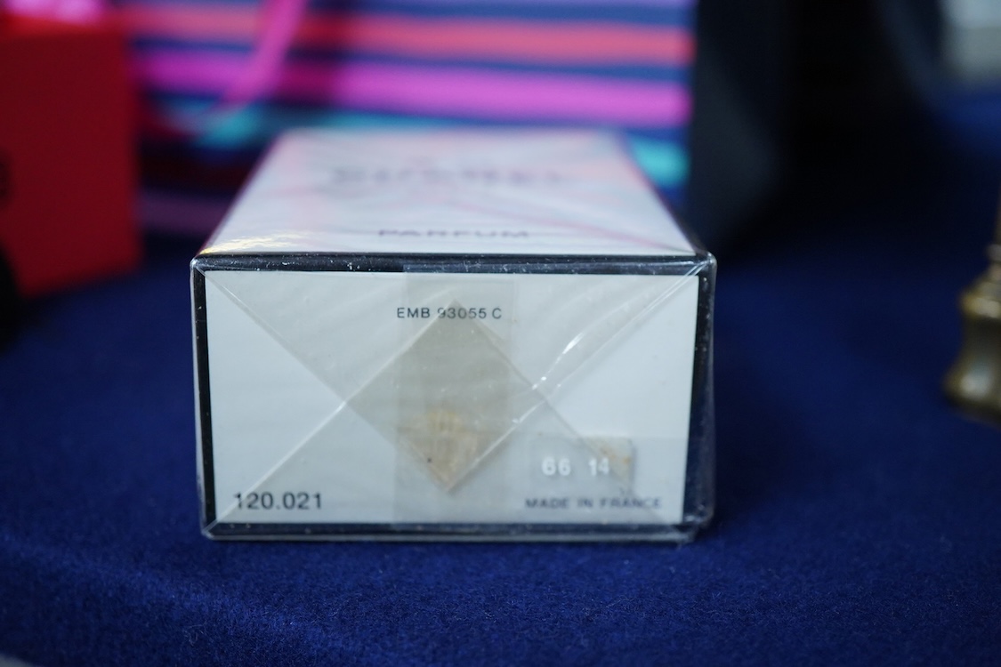 An unopened bottle of Chanel No.22 perfume, together with a boxed Paloma Picasso lipstick